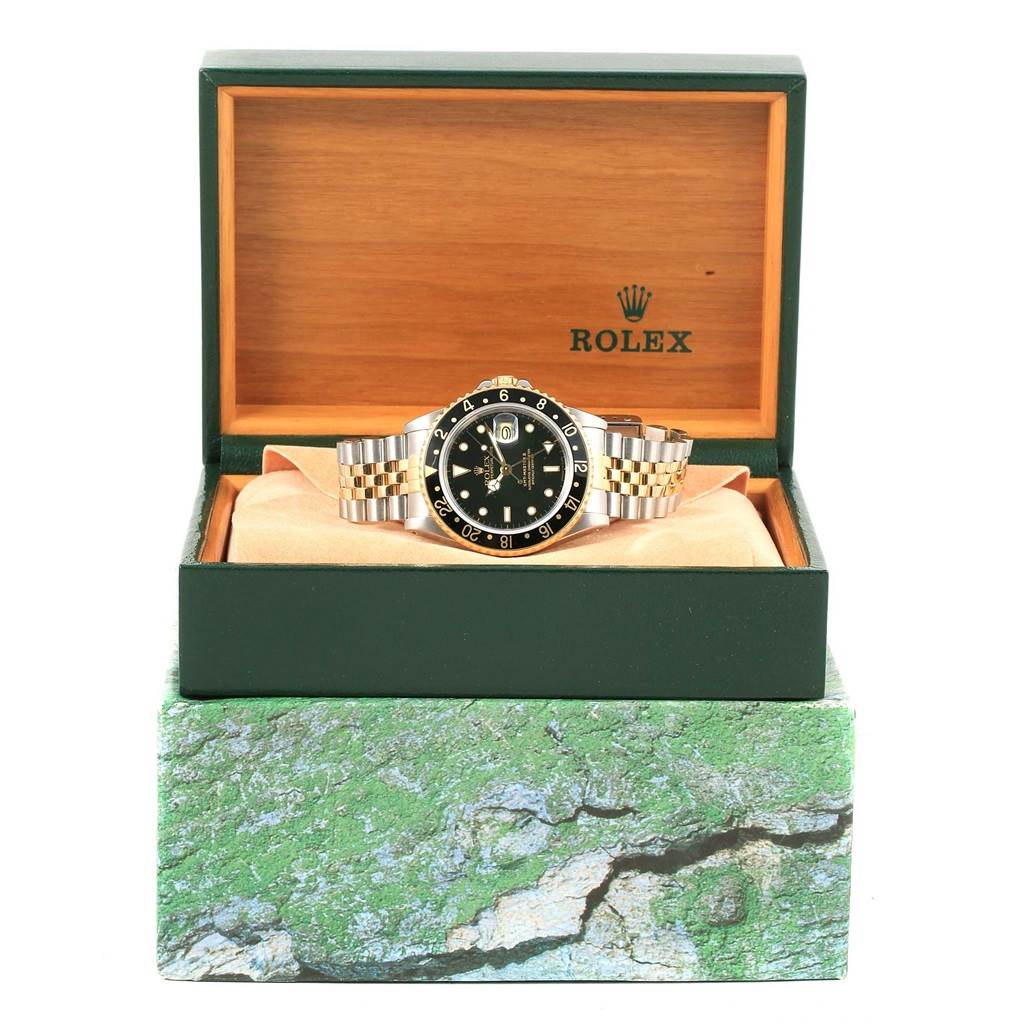 The Rolex GMT-Master 16713 Men's Stainless Steel Silver Dial 16713 Men's Stainless Steel Silver Dial watch is shown from the front in its open box, emphasizing its face and bracelet.