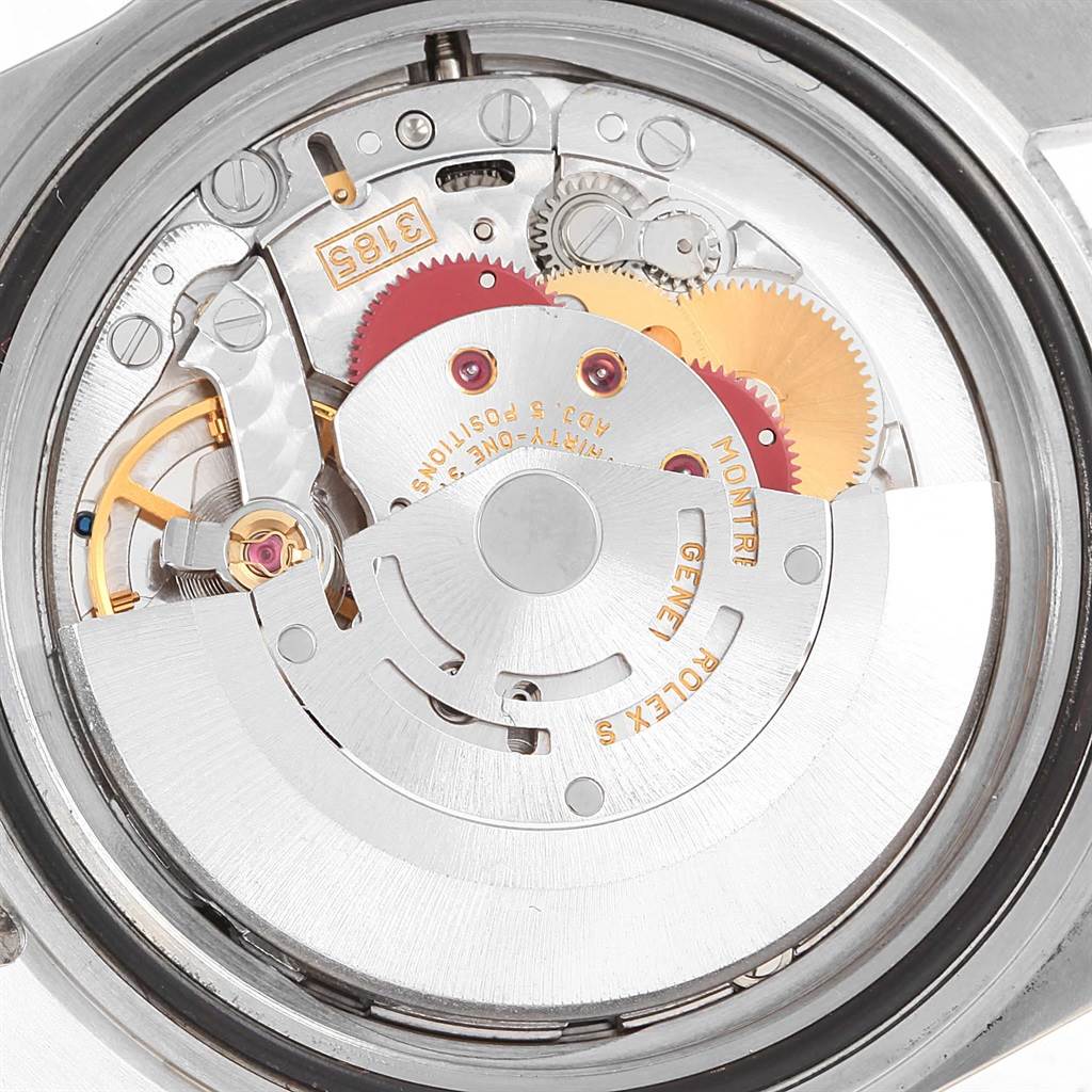 This is a close-up view of the movement inside a Rolex GMT-Master 16710 Men's Stainless Steel Black Dial 16710 Men's Stainless Steel Black Dial watch, showcasing its intricate mechanical parts.