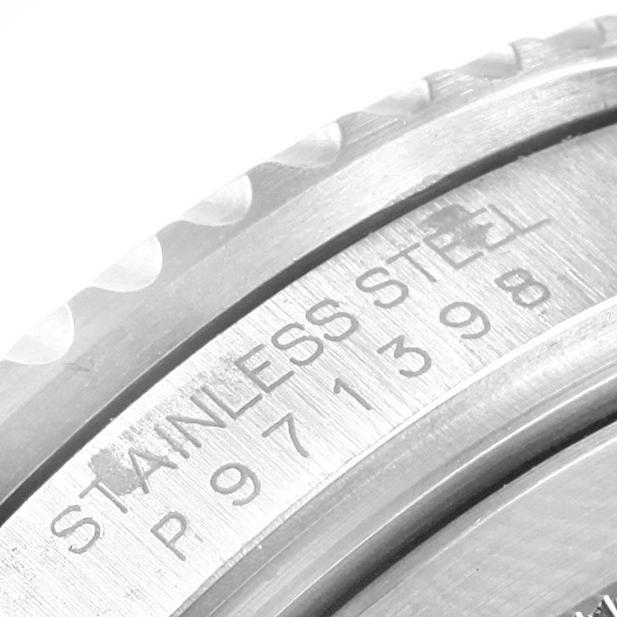 The image shows a close-up angle of the bezel and case back serial number engraving on a stainless steel Rolex GMT-Master 16710 Men's Stainless Steel Black Dial 16710 Men's Stainless Steel Black Dial watch.