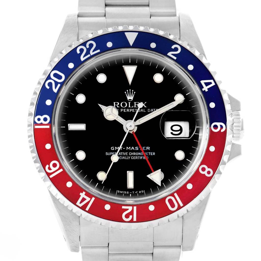 The image shows a front view of the Rolex GMT-Master 16700 Men's Stainless Steel Black Dial 16700 Men's Stainless Steel Black Dial watch, featuring its bezel, dial, hands, and date window.