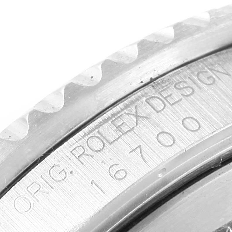 This image shows a close-up of the engraved text on the case of a Rolex GMT-Master 16700 Men's Stainless Steel Black Dial 16700 Men's Stainless Steel Black Dial watch, specifically model 16700.