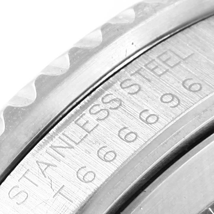 The image shows a close-up of the bezel and case engraving of a Rolex GMT-Master 16700 Men's Stainless Steel Black Dial 16700 Men's Stainless Steel Black Dial watch in stainless steel.