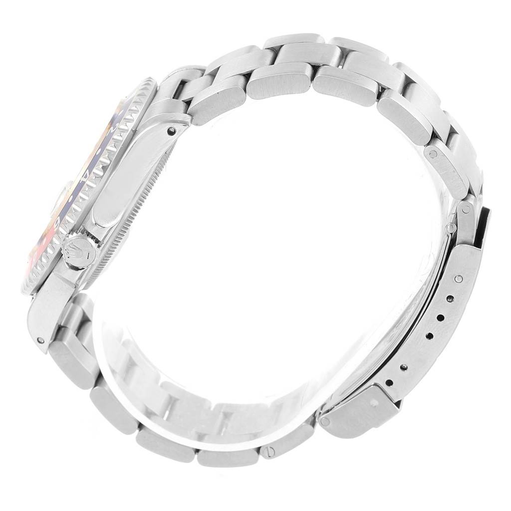 The image shows a side profile of the Rolex GMT-Master 16700 Men's Stainless Steel Black Dial 16700 Men's Stainless Steel Black Dial watch, focusing on the bezel, case, crown, and bracelet. 