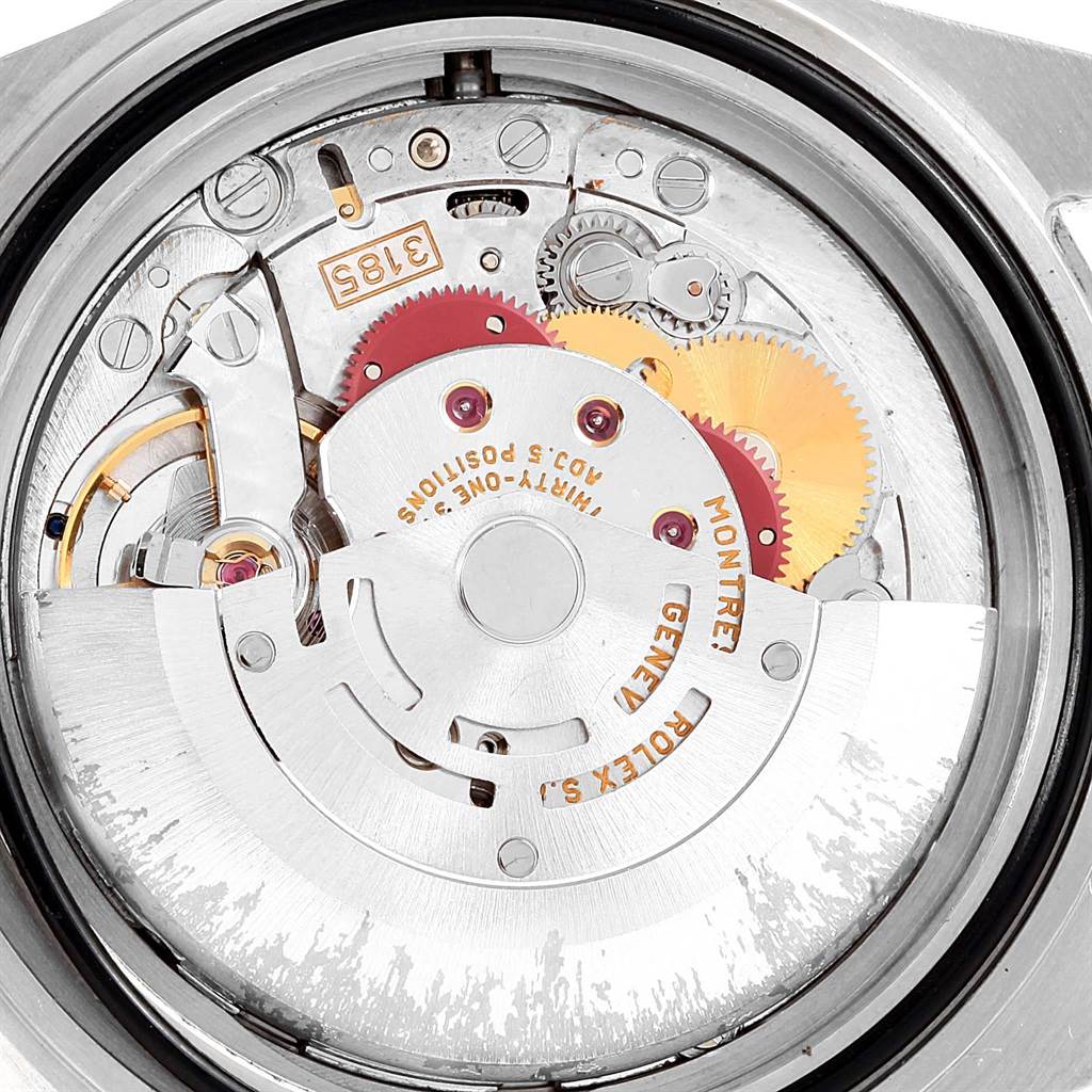 The image shows a close-up of the movement and internal mechanism of a Rolex GMT-Master 16710 Men's Stainless Steel Black Dial 16710 Men's Stainless Steel Black Dial watch.