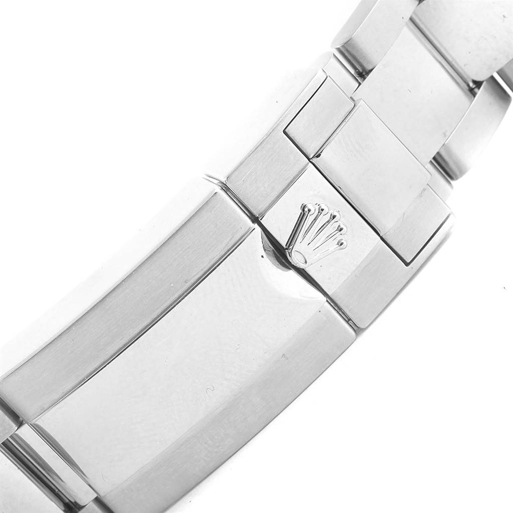 The image shows a close-up of a clasp on the bracelet of a Rolex GMT-Master 116710 Men
s Stainless Steel Black Dial 116710 Men
s Stainless Steel Black Dial watch, featuring the Rolex crown logo.