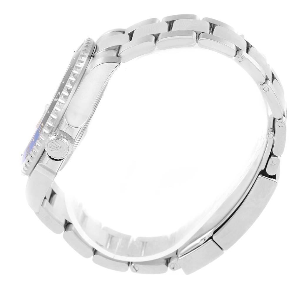 This side view of the Rolex GMT-Master 116710 Men
s Stainless Steel Black Dial 116710 Men
s Stainless Steel Black Dial watch shows the crown, bezel, and a portion of the bracelet.