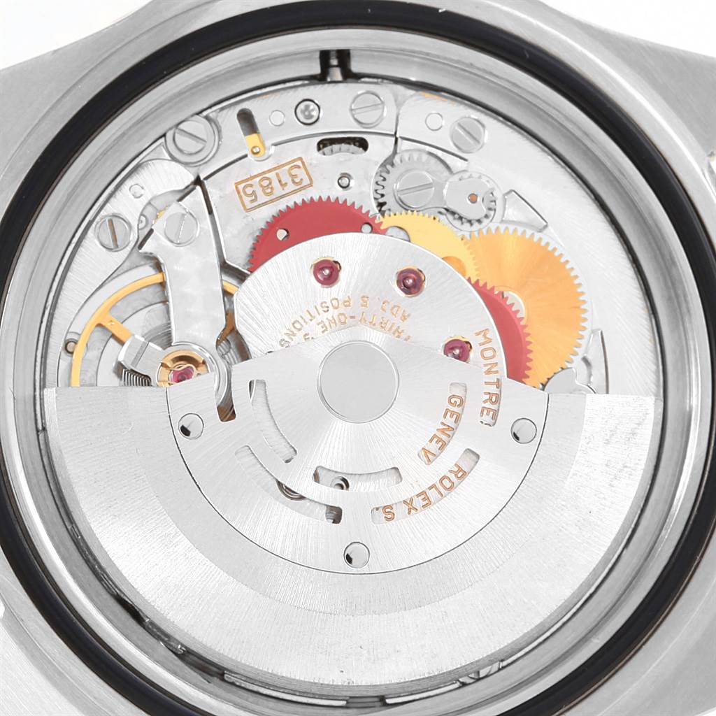 Close-up view of the movement and internal mechanism of the Rolex GMT-Master 16713 Men's Stainless Steel Black Dial 16713 Men's Stainless Steel Black Dial watch.