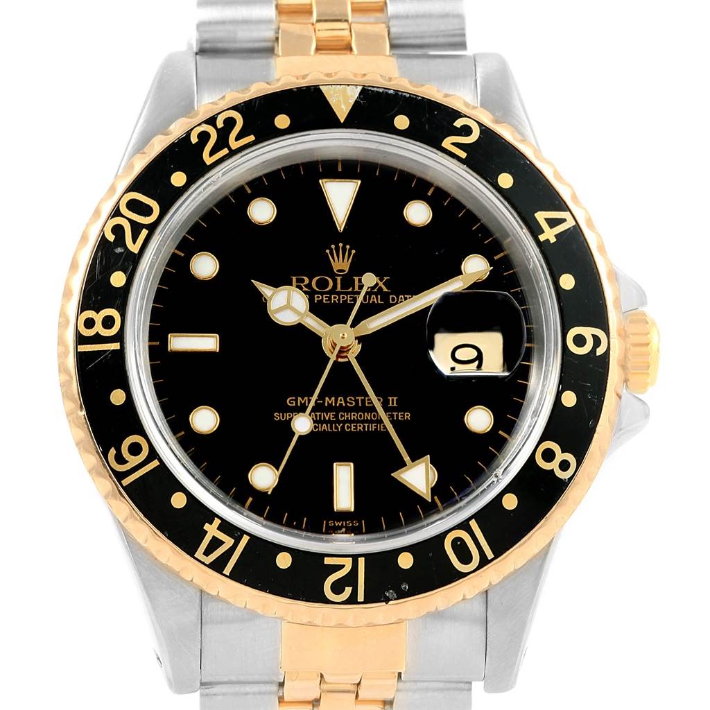 The image shows a front view of a Rolex GMT-Master 16713 Men's Stainless Steel Black Dial 16713 Men's Stainless Steel Black Dial II watch, highlighting the black dial, bezel, face, and two-tone bracelet.