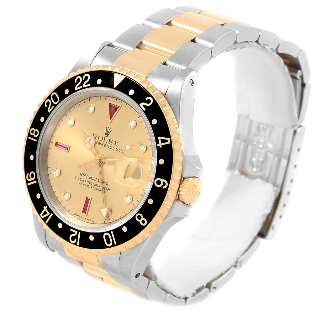 The image shows a Rolex GMT-Master 16713 Men's Stainless Steel Champagne Dial 16713 Men's Stainless Steel Champagne Dial watch at an angle displaying its face, bezel, crown, and dual-tone bracelet.