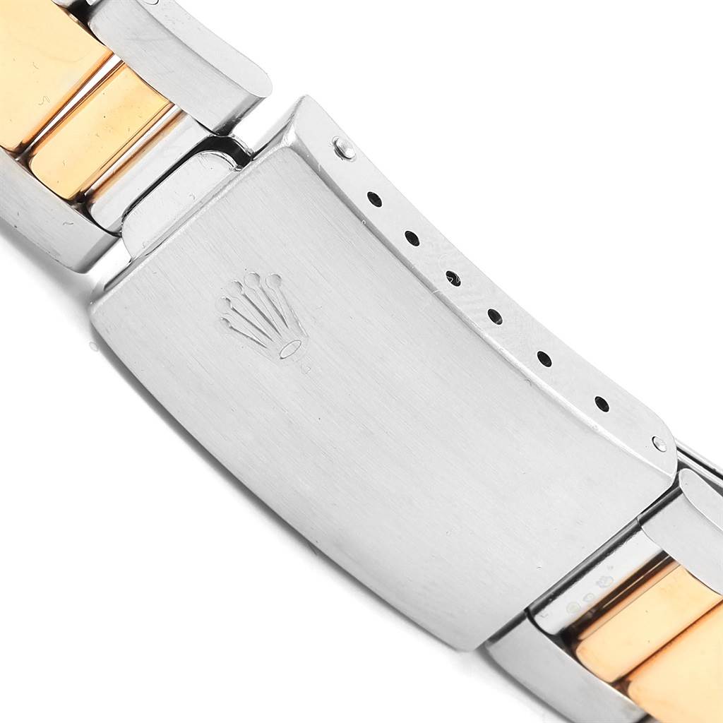 The image shows a close-up of the clasp and bracelet of a Rolex GMT-Master 16713 Men's Stainless Steel Champagne Dial 16713 Men's Stainless Steel Champagne Dial watch.