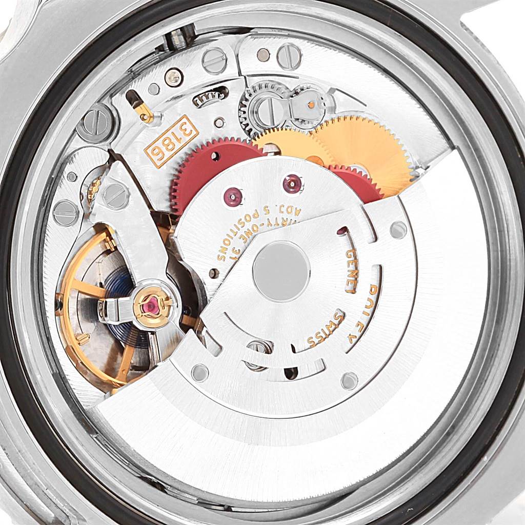 This image shows the intricate movement and internal components of the Rolex GMT-Master 116710 Men's Stainless Steel Black Dial 116710 Men's Stainless Steel Black Dial watch from a top-down view.