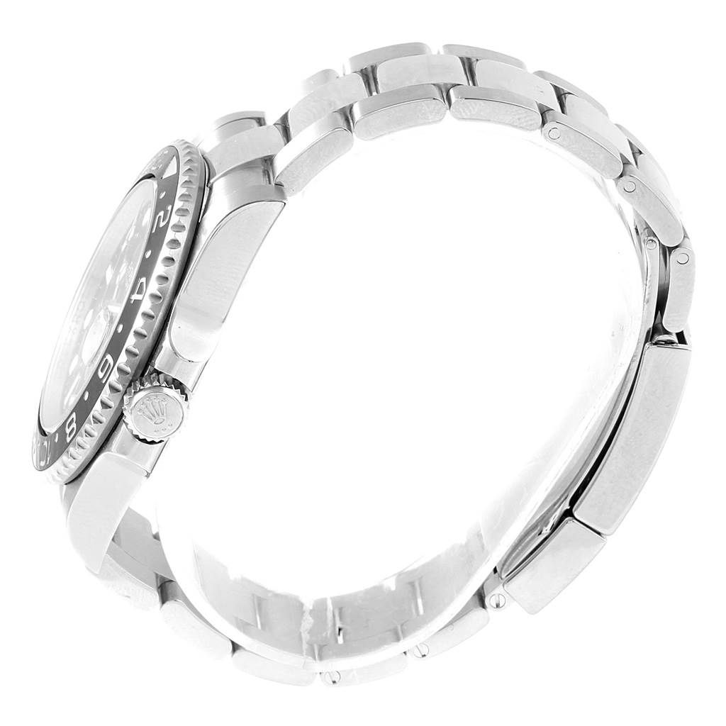 The image shows a side view of the Rolex GMT-Master 116710 Men's Stainless Steel Black Dial 116710 Men's Stainless Steel Black Dial watch, highlighting its band, crown, and part of the bezel.