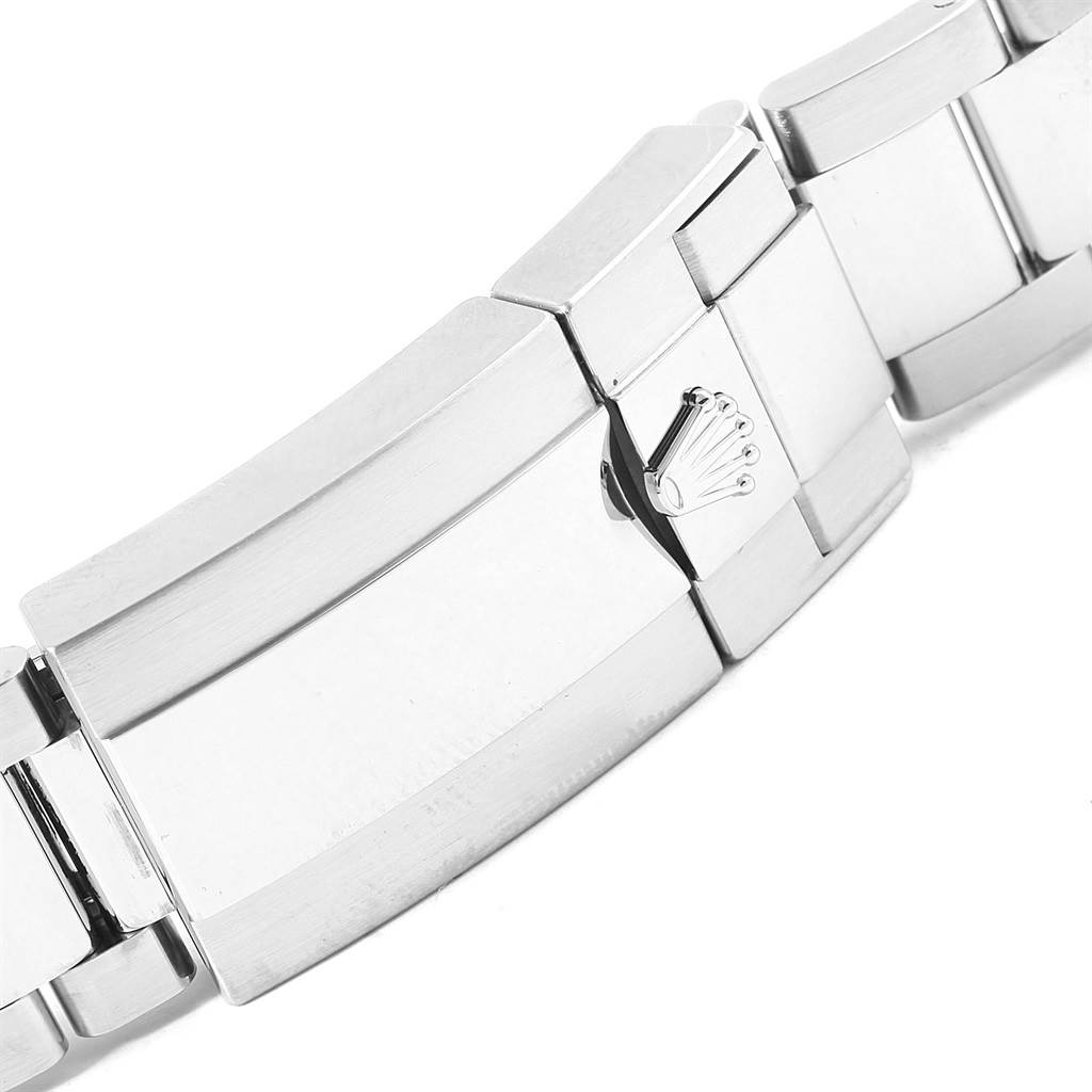 This image shows a close-up of the clasp on a Rolex GMT-Master 116710 Men's Stainless Steel Black Dial 116710 Men's Stainless Steel Black Dial watch bracelet, featuring the Rolex logo.