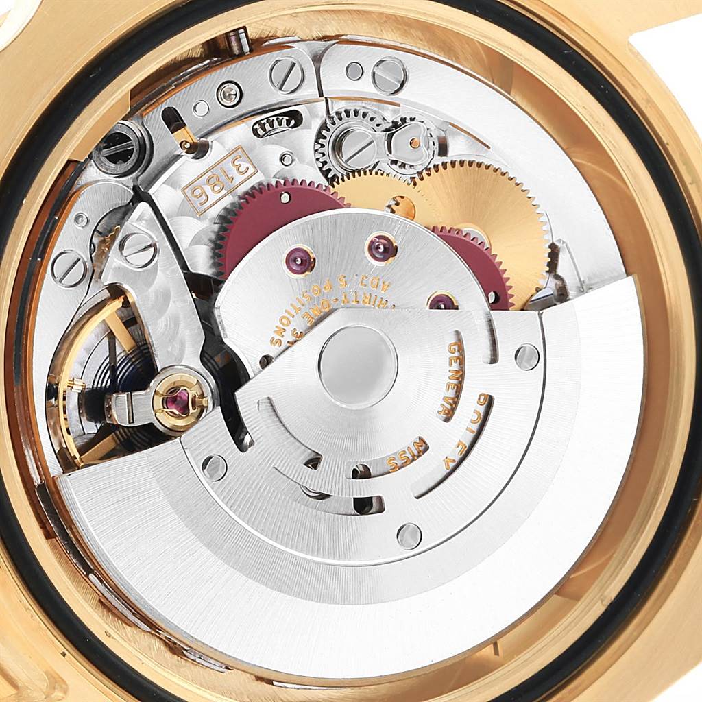 The image shows a detailed view of the movement mechanism of a Rolex GMT-Master 116718 Men's Yellow Gold Green Dial 116718 Men's Yellow Gold Green Dial watch from the back.