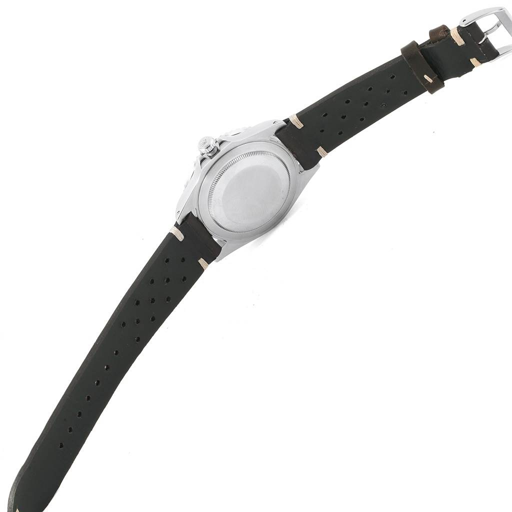 This image shows the back case and clasp of a Rolex GMT-Master 16700 Men's Stainless Steel Black Dial 16700 Men's Stainless Steel Black Dial watch from a flat, horizontal angle.