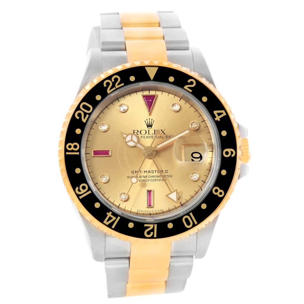 The image shows a front view of a Rolex GMT-Master 16713 Men's Stainless Steel Champagne Dial 16713 Men's Stainless Steel Champagne Dial II watch with a gold and silver bracelet, black bezel, and gold dial.