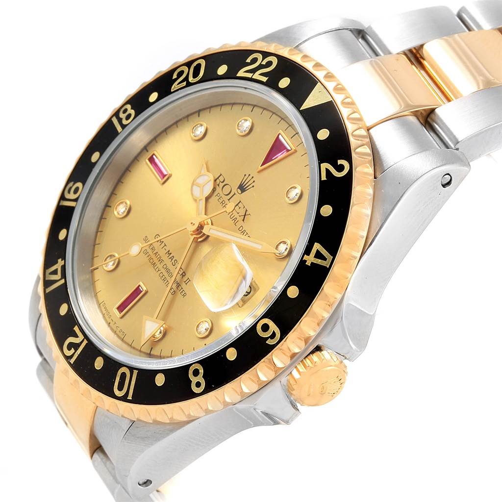 The image shows a Rolex GMT-Master 16713 Men's Stainless Steel Champagne Dial 16713 Men's Stainless Steel Champagne Dial watch from an angled side view, highlighting its bezel, dial, crown, and two-tone bracelet.