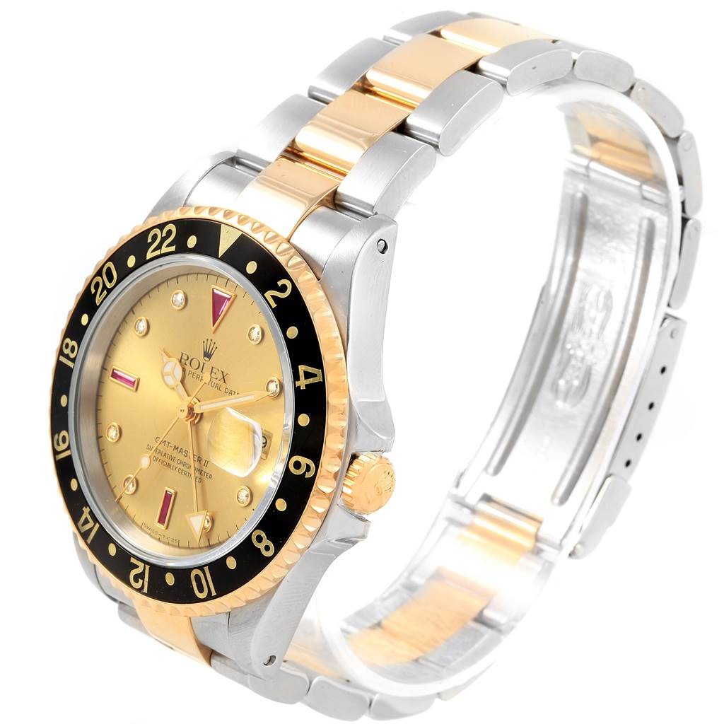 The image shows a Rolex GMT-Master 16713 Men's Stainless Steel Champagne Dial 16713 Men's Stainless Steel Champagne Dial watch angled to display its gold and black bezel, dial, and two-tone bracelet.