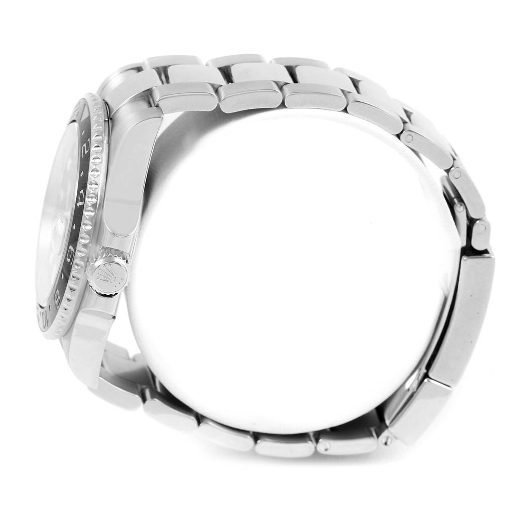 The image shows a side view of a Rolex GMT-Master 116710 Men's Stainless Steel Black Dial 116710 Men's Stainless Steel Black Dial watch focusing on the bezel, crown, and part of the bracelet.