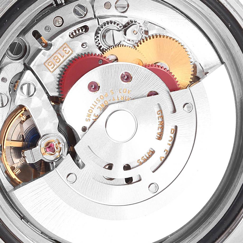 The image shows a close-up of the internal movement parts of a Rolex GMT-Master 116710 Men's Stainless Steel Black Dial 116710 Men's Stainless Steel Black Dial watch.