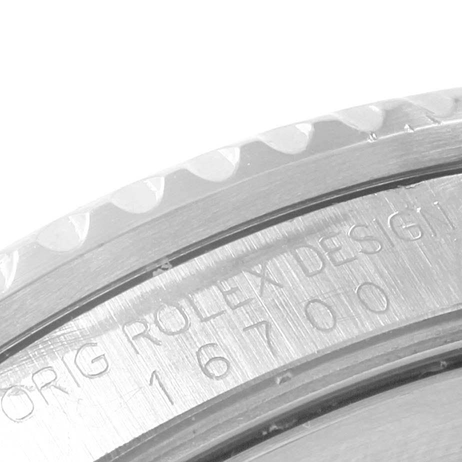 This image shows a close-up of the engraving on the case back of a Rolex GMT-Master 16700 Men's Stainless Steel Black Dial 16700 Men's Stainless Steel Black Dial model watch.
