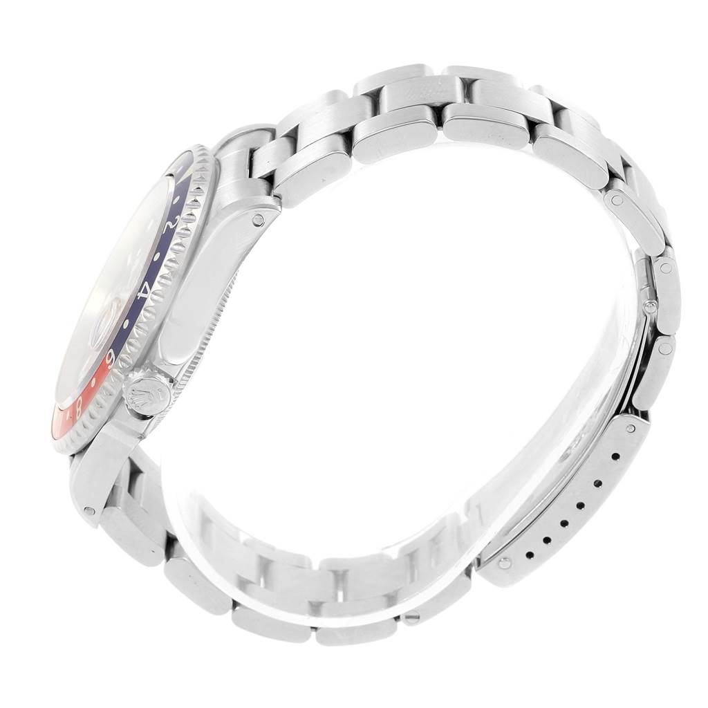 This image shows the side view of a Rolex GMT-Master 16700 Men's Stainless Steel Black Dial 16700 Men's Stainless Steel Black Dial watch highlighting the bracelet and case.