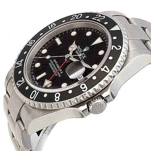 The image shows a side angle of the Rolex GMT-Master 16710 Men's Stainless Steel Black Dial 16710 Men's Stainless Steel Black Dial watch, detailing the bezel, dial, and part of the bracelet.