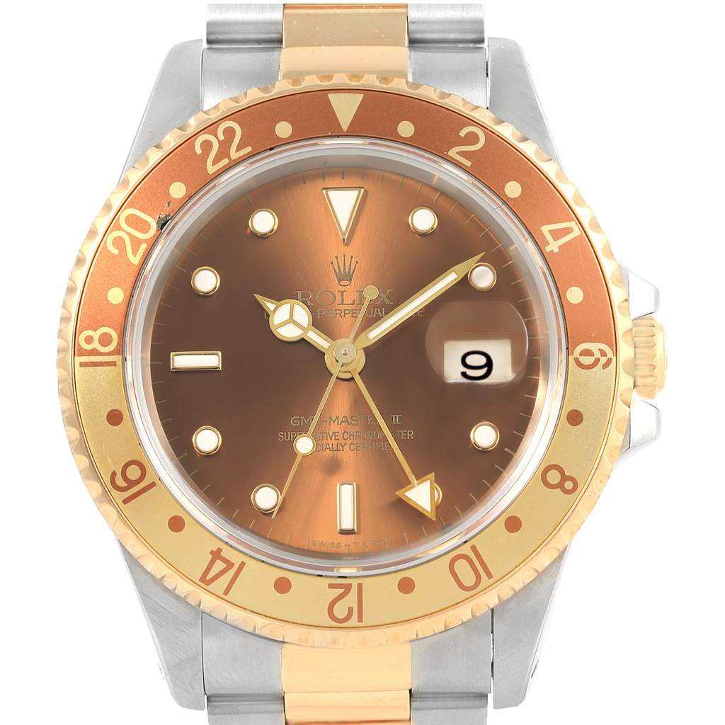 This image shows the face and bezel of a Rolex GMT-Master 16713 Men's Stainless Steel Brown Dial 16713 Men's Stainless Steel Brown Dial watch, stainless steel and gold case, at a straight-on angle.