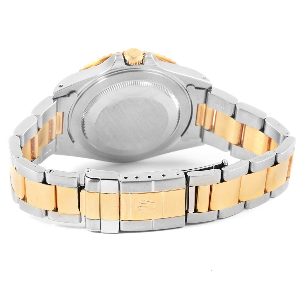 The image shows the rear view of a Rolex GMT-Master 16713 Men's Stainless Steel Brown Dial 16713 Men's Stainless Steel Brown Dial watch highlighting the two-tone bracelet and case back.