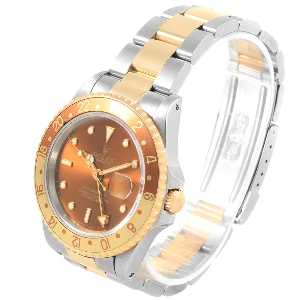 The image shows a Rolex GMT-Master 16713 Men's Stainless Steel Brown Dial 16713 Men's Stainless Steel Brown Dial watch at a three-quarter angle, emphasizing the dial, bezel, and bracelet.