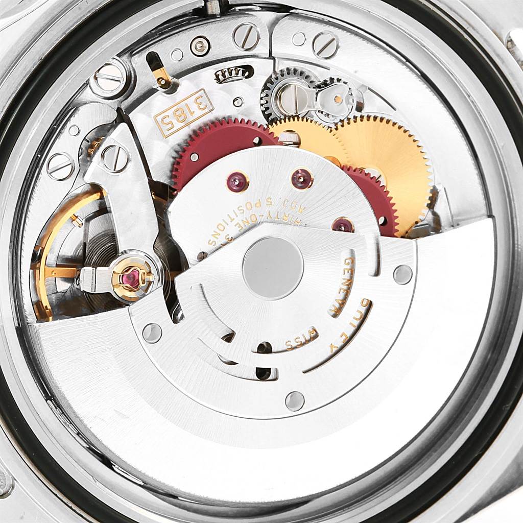 This is a close-up of the inner mechanical movement of a Rolex GMT-Master 16710 Men's Stainless Steel Black Dial 16710 Men's Stainless Steel Black Dial watch, showing gears and the rotor.