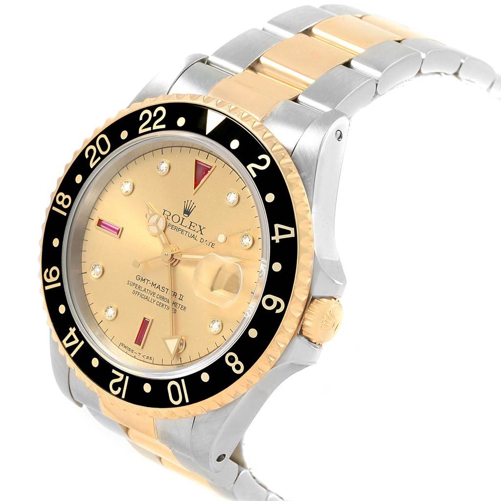 This image shows a side angle of a Rolex GMT-Master 16713 Men's Stainless Steel Champagne Dial 16713 Men's Stainless Steel Champagne Dial II watch, highlighting its bezel, dial, and two-tone bracelet.