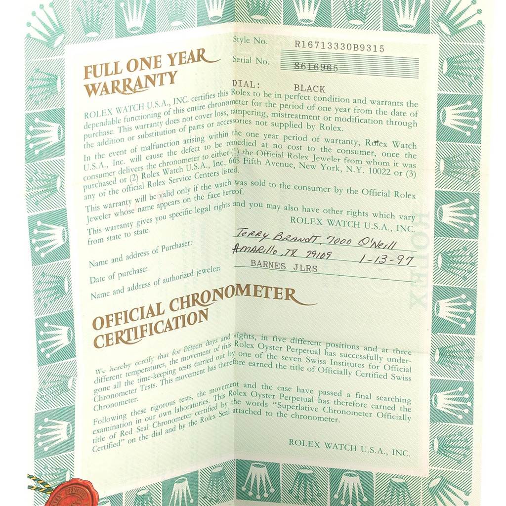 This is an official warranty and chronometer certification document for a Rolex GMT-Master 16713 Men's Steel and Gold (two tone) Champagne Dial 16713 Men's Steel and Gold (two tone) Champagne Dial watch, viewed from a top-down angle.