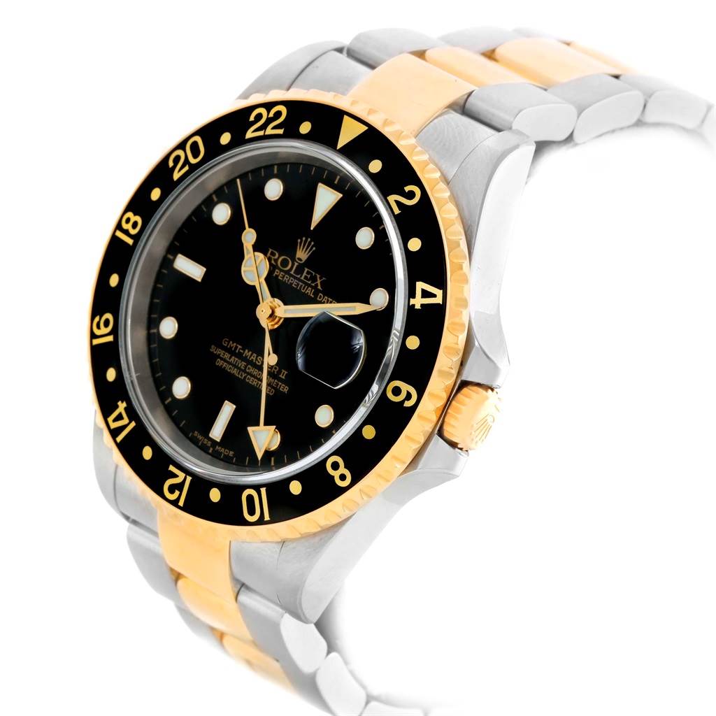 The image shows a Rolex GMT-Master 16713 Men's Stainless Steel Black Dial 16713 Men's Stainless Steel Black Dial watch at a slight angle, highlighting the dial, bezel, and two-tone bracelet.