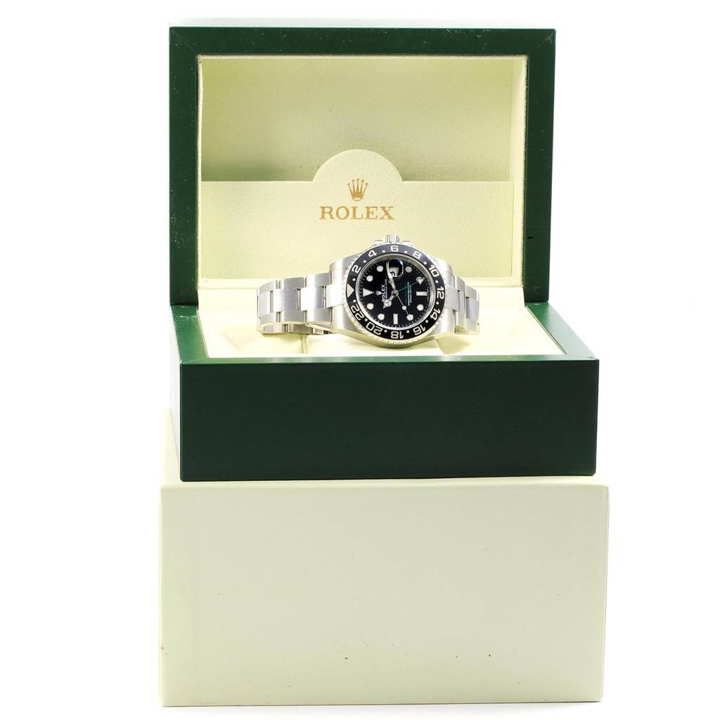 The Rolex GMT-Master 116710 Men
s Stainless Steel Black Dial 116710 Men
s Stainless Steel Black Dial watch is shown in a front angle inside an open presentation box.