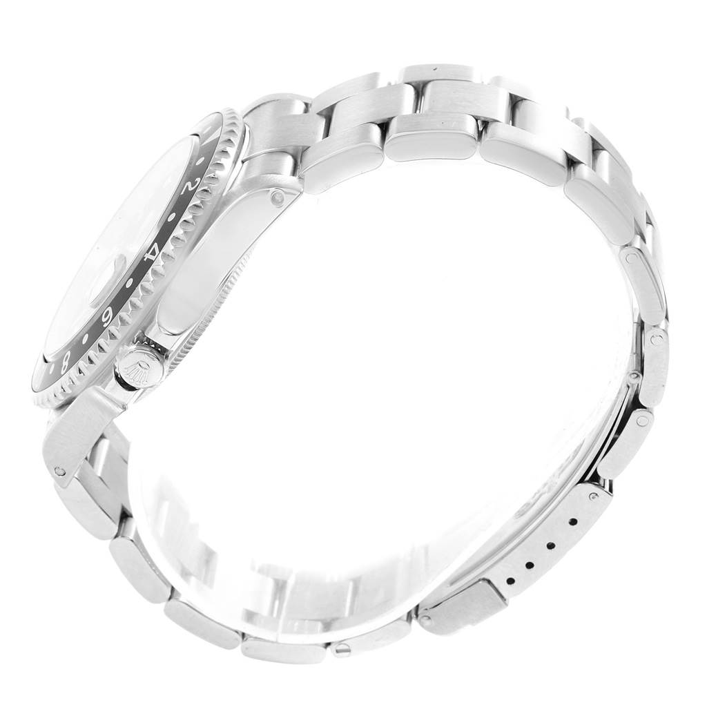 This image shows a side view of a Rolex GMT-Master 16710 Men's Stainless Steel Black Dial 16710 Men's Stainless Steel Black Dial watch, highlighting the bracelet and partially obscured bezel.