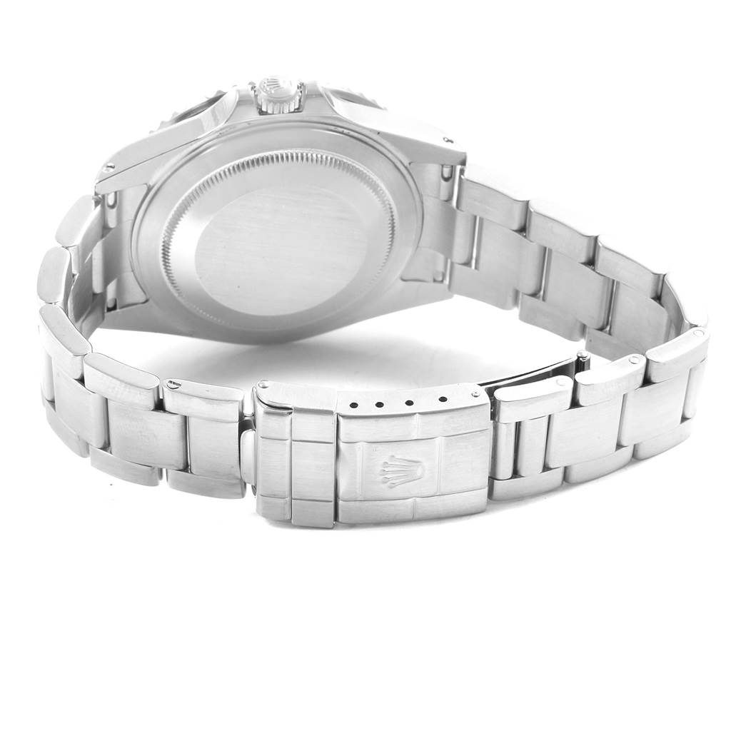 The image shows the back case, crown, and metal bracelet of a Rolex GMT-Master 16710 Men's Stainless Steel Black Dial 16710 Men's Stainless Steel Black Dial watch from a rear angle.