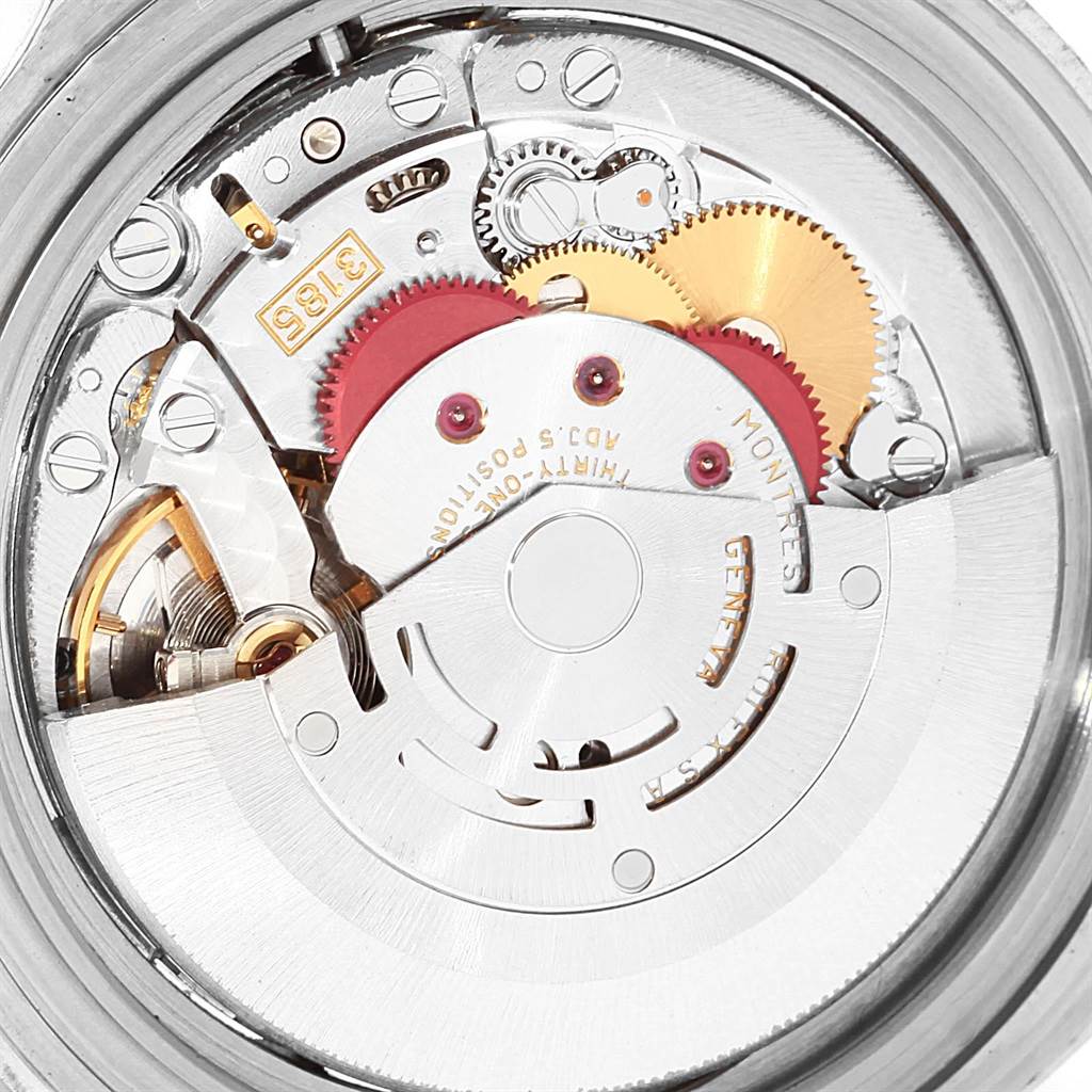 This image shows the internal mechanical movement of a Rolex GMT-Master 16710 Men's Stainless Steel Black Dial 16710 Men's Stainless Steel Black Dial watch, highlighting gears and other components.
