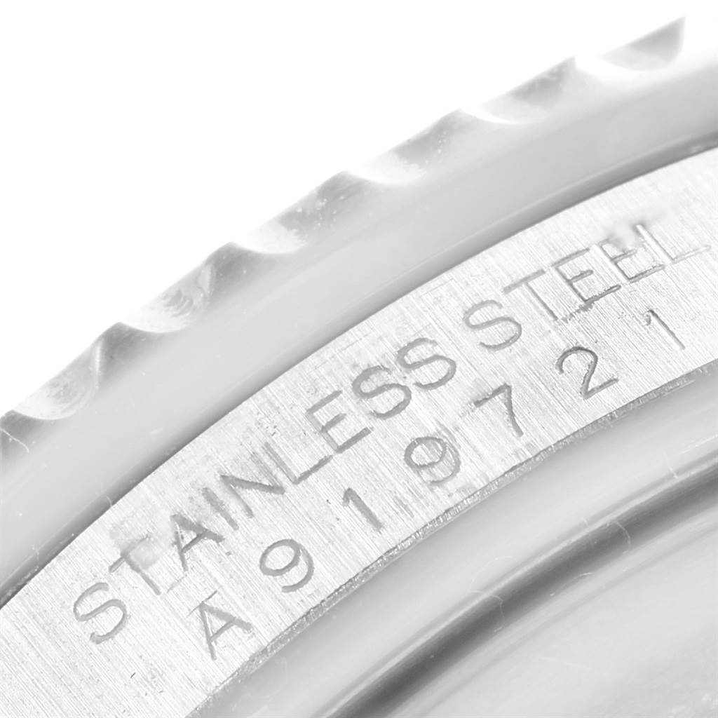 This close-up image shows the stainless steel case and engraved model number of the Rolex GMT-Master 16710 Men's Stainless Steel Black Dial 16710 Men's Stainless Steel Black Dial watch.