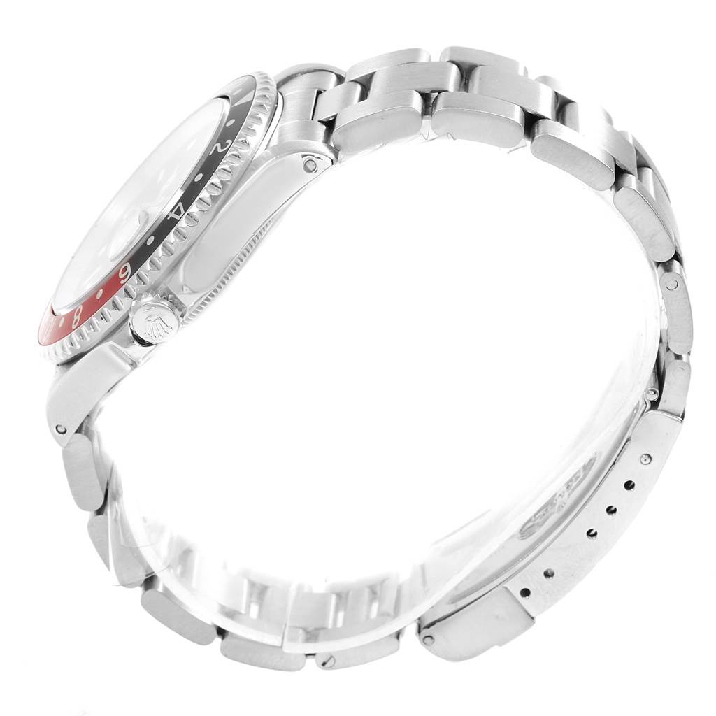 The watch shown is the Rolex GMT-Master 16700 Men's Stainless Steel Black Dial 16700 Men's Stainless Steel Black Dial, viewed from a side angle, showcasing the bezel, crown, and bracelet.