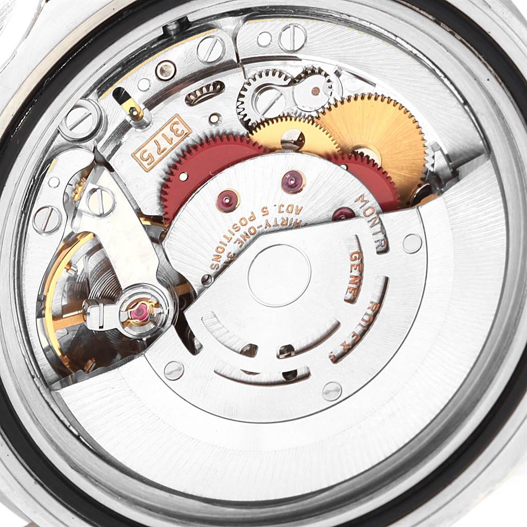 This image shows the movement mechanism of a Rolex GMT-Master 16700 Men's Stainless Steel Black Dial 16700 Men's Stainless Steel Black Dial model watch from an angle inside the case back.