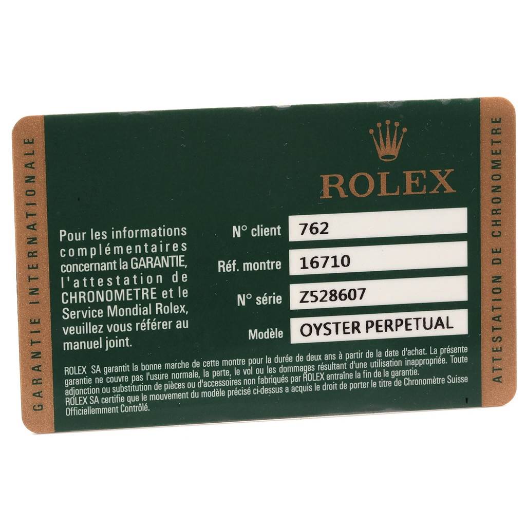 The image shows a warranty card for a Rolex GMT-Master 16710 Men's Stainless Steel Black Dial 16710 Men's Stainless Steel Black Dial model, displaying reference, serial number, and model details.