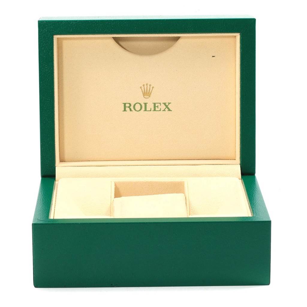 This image shows an open green and beige box for a Rolex GMT-Master 16710 Men's Stainless Steel Black Dial 16710 Men's Stainless Steel Black Dial watch, featuring the brand's logo inside the lid.