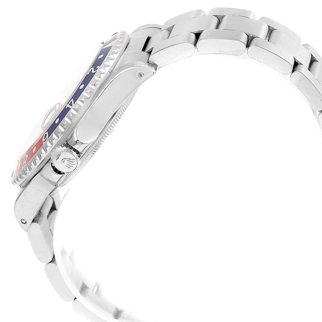 The image shows a side view of a Rolex GMT-Master 16710 Men's Stainless Steel Black Dial 16710 Men's Stainless Steel Black Dial watch, highlighting the bezel and part of the strap.