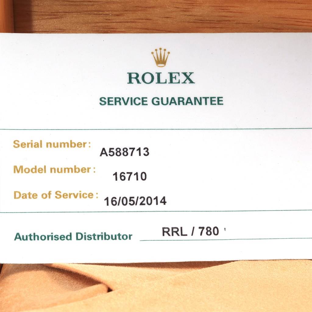 The image shows a Rolex Service Guarantee card for the GMT-Master model 16710 with a serial number A588713 and date of service 16/05/2014.