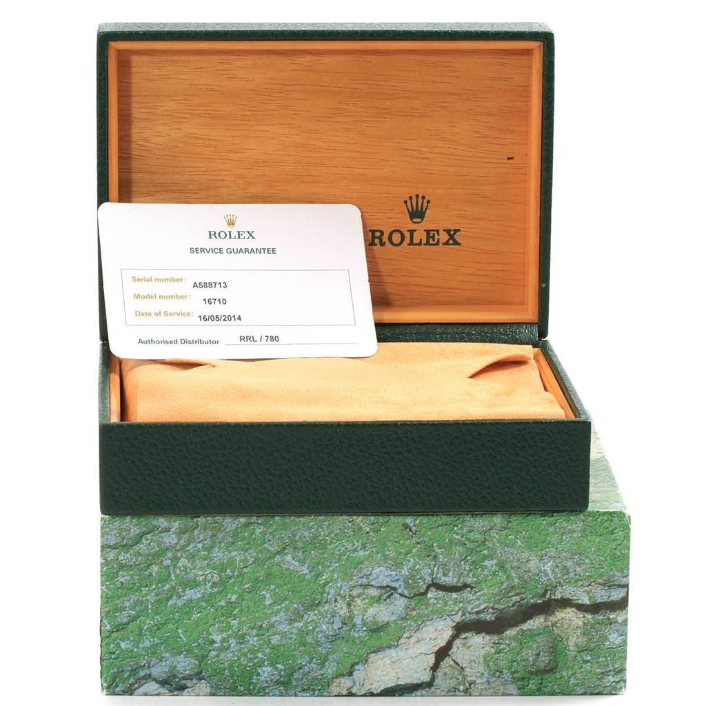 The image shows a Rolex GMT-Master 16710 Men's Stainless Steel Black Dial 16710 Men's Stainless Steel Black Dial model box, an inner cushion, and a service guarantee card.