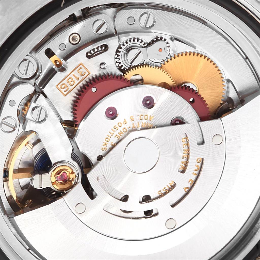 This image shows the intricate internal mechanics of a Rolex GMT-Master 116710 Men's Stainless Steel Black Dial 116710 Men's Stainless Steel Black Dial watch movement from an overhead angle.