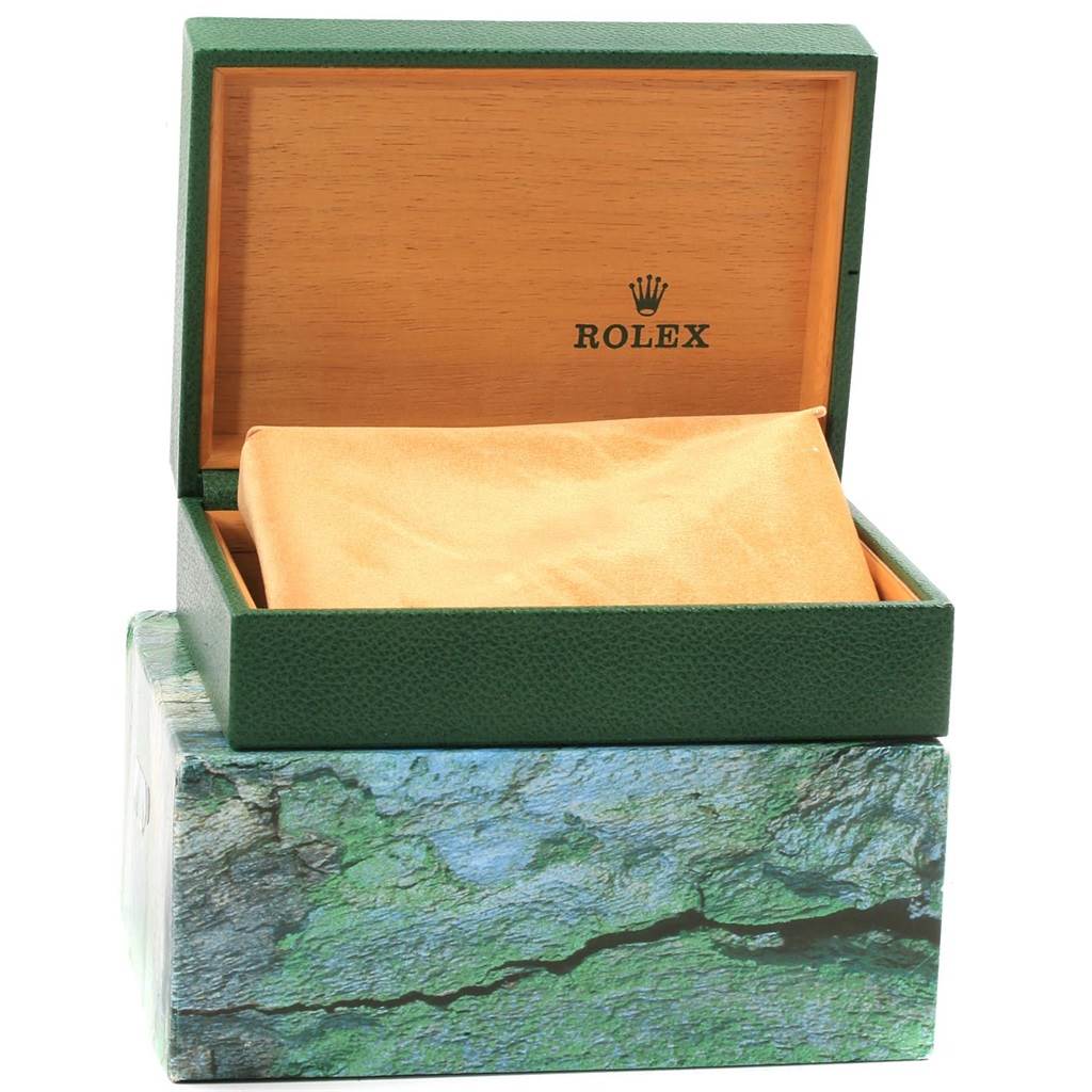 The image shows an open Rolex GMT-Master 16713 Men's Stainless Steel Black Dial 16713 Men's Stainless Steel Black Dial watch box with an orange cloth inside.