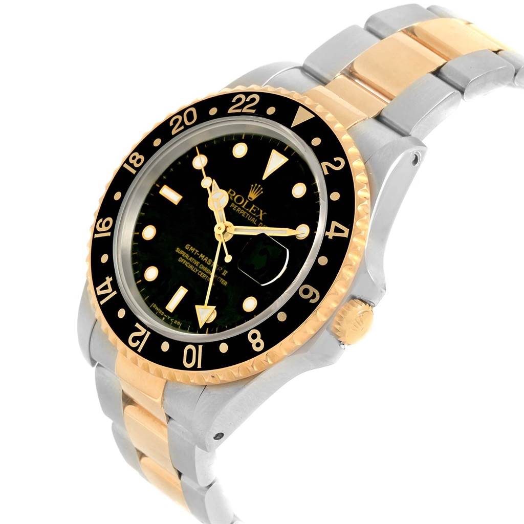This image shows a Rolex GMT-Master 16713 Men's Stainless Steel Black Dial 16713 Men's Stainless Steel Black Dial watch from an angled side view, highlighting the bezel, dial, crown, and bracelet.