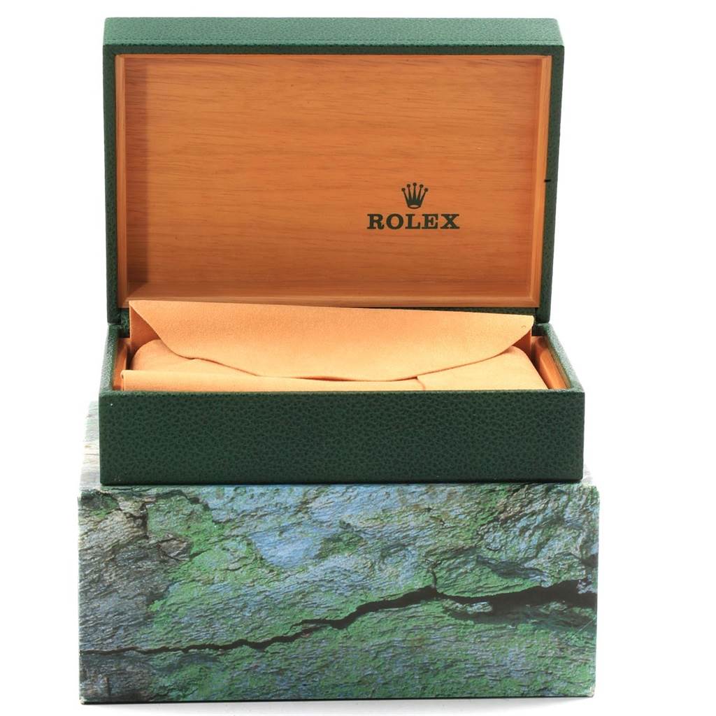 This image shows an open green Rolex box with a protective cloth, designated for the GMT-Master model.